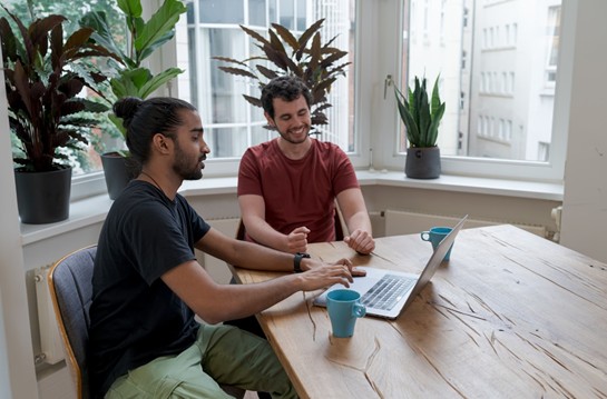 Team members optimizing customer reach with an integrated marketing approach